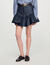 Falda corta de denim con volantes