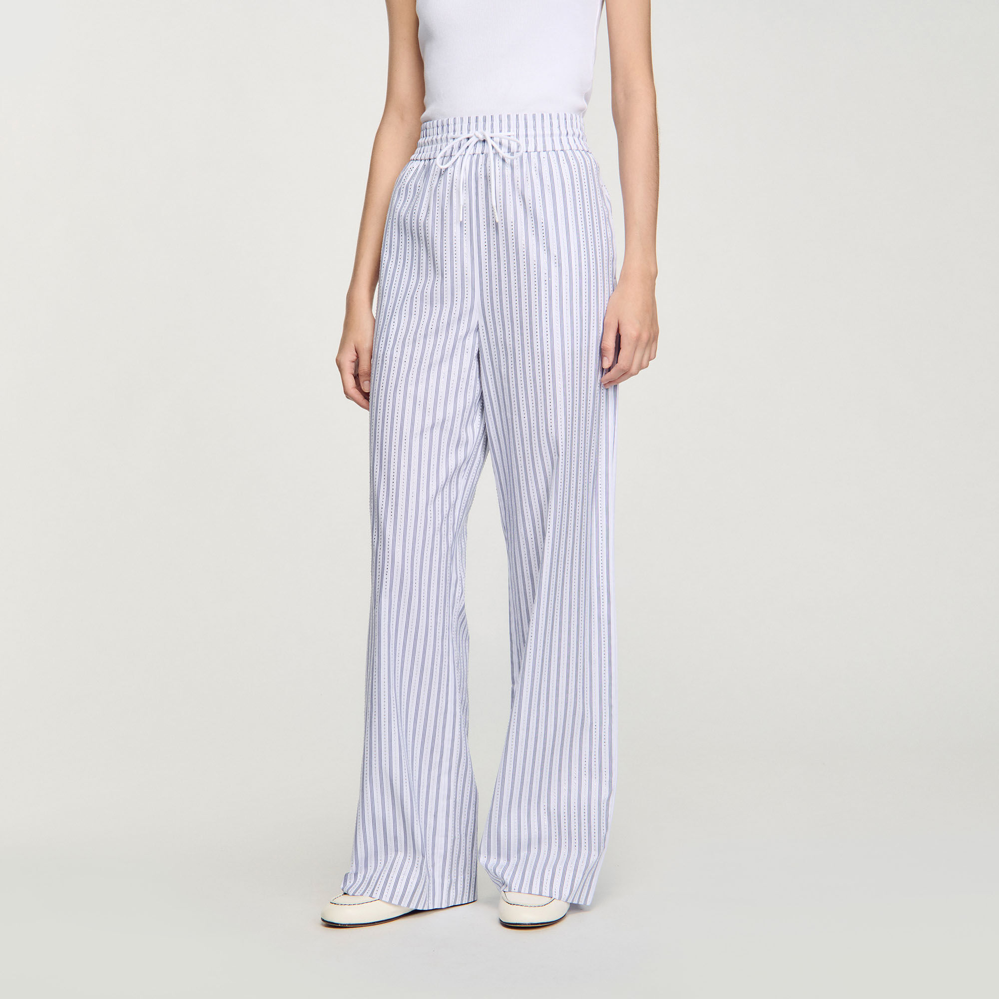 Pantalón a rayas con brillantes