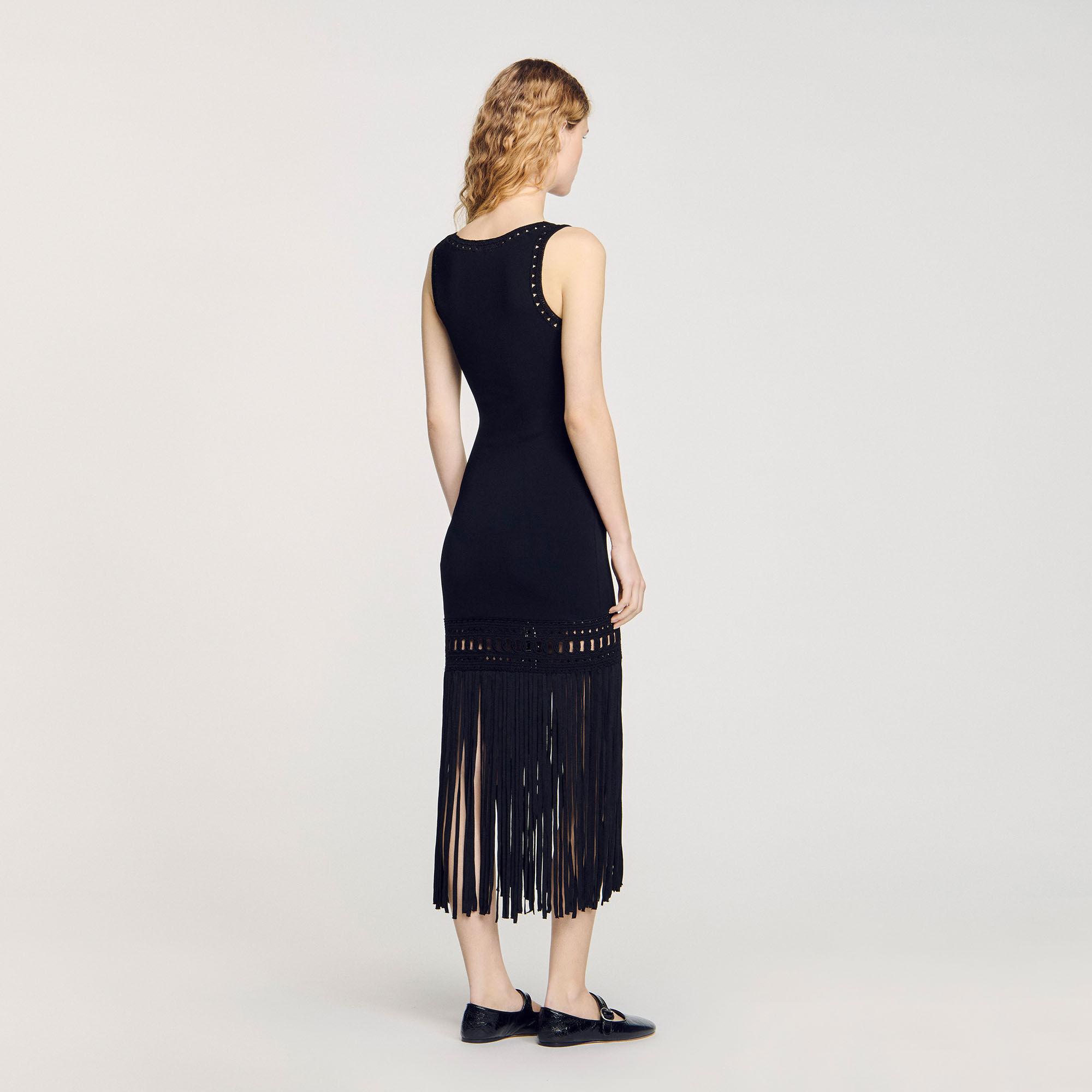 Vestido de punto con flecos