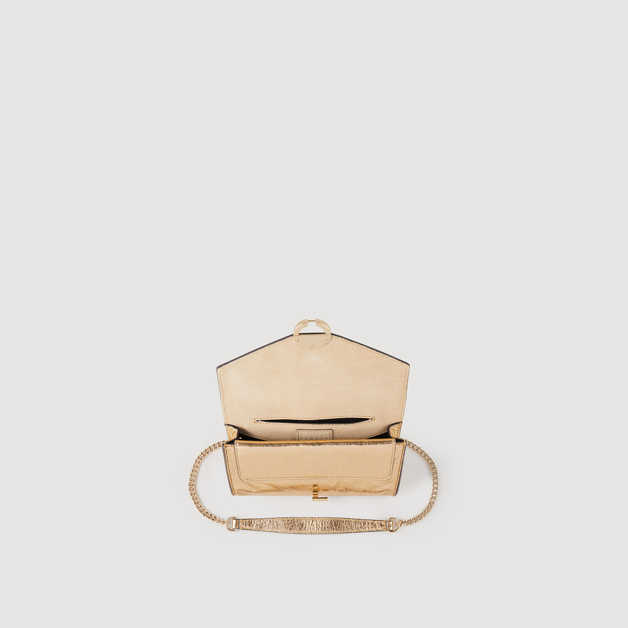 Bolso pochette de piel dorada