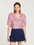 Camisa a rayas con volantes